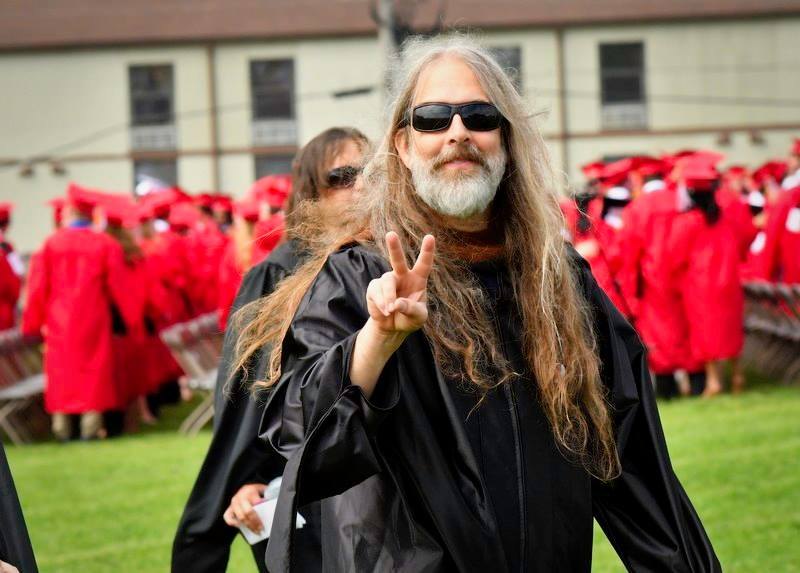 David B. Campbell in academic regalia at a graduation ceremony.